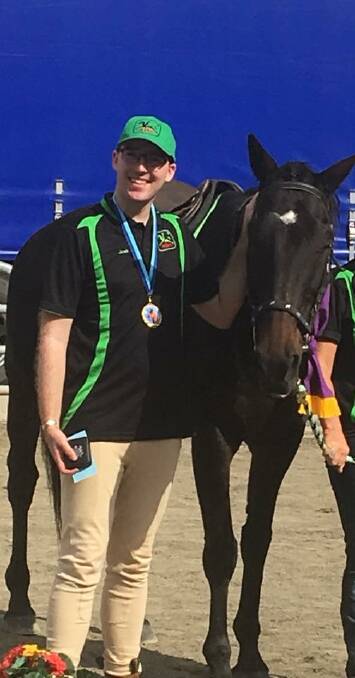 READY AND ABLE: Josh Adam rode Harry at the 2018 Sydney Royal Easter Show, culminating in the brown gelding being awarded the Riding for the Disabled Association (NSW) champion horse.