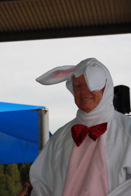 Batemans Bay Public School Principal Tom Purcell said the school didn't shy away from hot-cross buns or scripture at Easter - as this picture of him taken dressed as the Easter Bunny at the school's 2016 parade shows. The school has been at the centre of a social media storm over the name of its parade.
