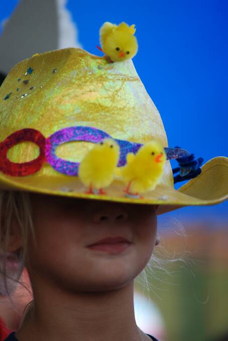 A student at Batemans Bay Public School models her creation in the 2016 Happy Hat Parade.