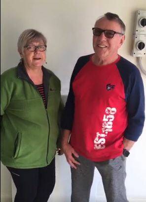 COSMIC CURRENT: Lyn Jordan and Michael Lane in front have the first Tesla Powerwall 2 to be installed in NSW, at their home in Sunshine Bay.