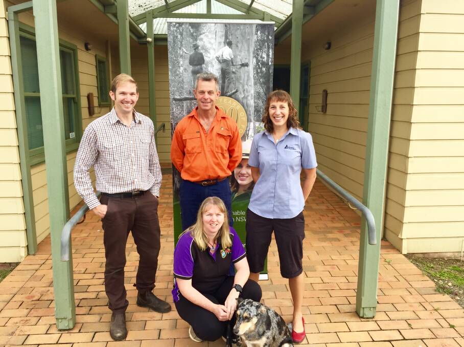 Andrew Costello, Bruce McGee, Lee Backhouse, Murphy, and Megan Costello from Forestry Corporation at Batemans Bay are charging through March to raise funds for the Cancer Council.