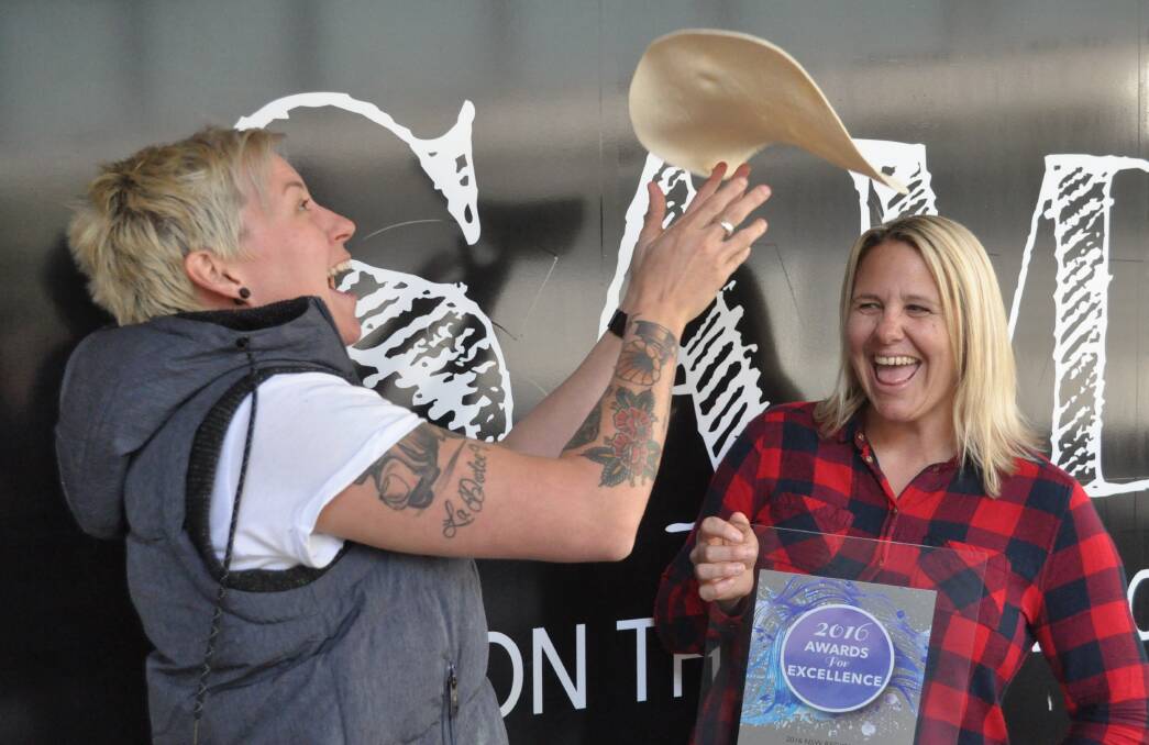 DOUGHN'T FEEL GOOD: Joanna Imrie and Emma Corbett from Sam's Pizzeria are all smiles following their win in Sydney last week.