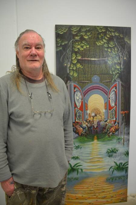 ALL IN ART: Moruya artist Pete Gallagher with one of his artworks, inspired by author J.R.R. Tolkien, that will be on display at Art Central's annual exhibition, from October 12-21.