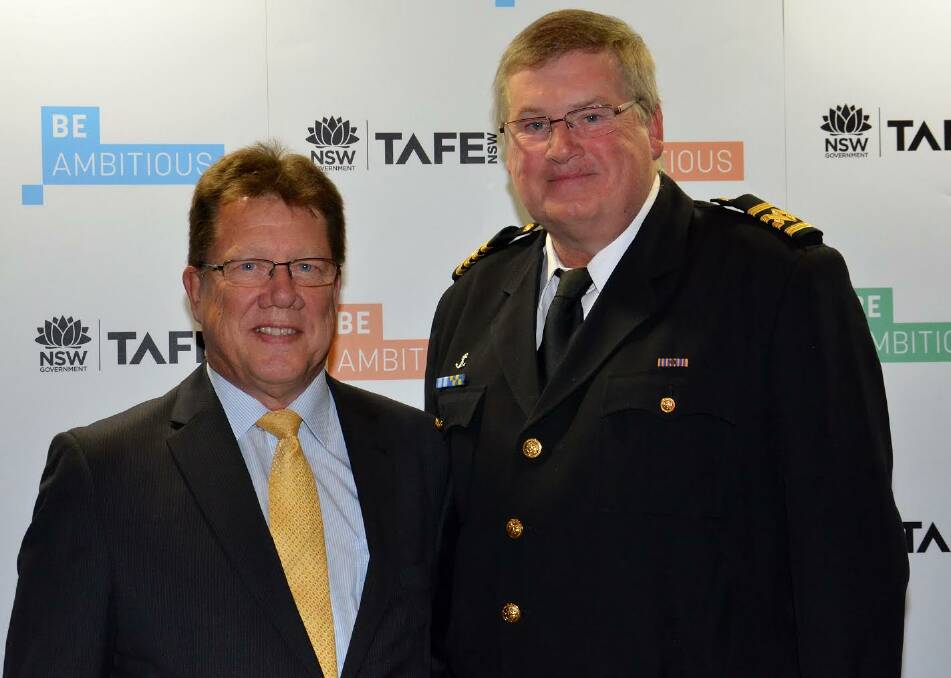 SEA CHANGE: Moruya TAFE graduate Keith Wrench (left, with Col Tritton, right) was a big winner at the recent Illawarra student awards night.