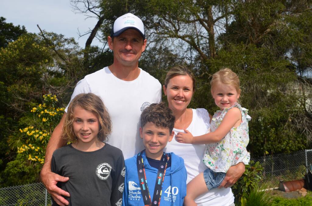 FAMILY FIRST: Eurobodalla Ironman Daniel Beby enjoys time with his wife Michelle and children Riley, Mitchell and Ashlee after his recent Kona experience.