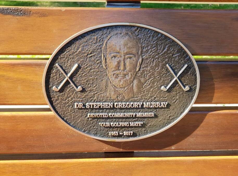 REMEMBERED: Dr Steve Murray's memory has been honoured with a bench seat and personalised plaque installed at the 16th hole at Moruya Golf Course.
