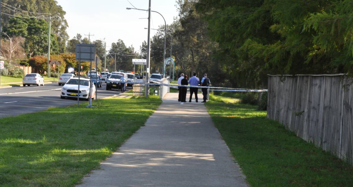 BODY FOUND: Police at the crime scene in Batehaven on Tuesday morning.