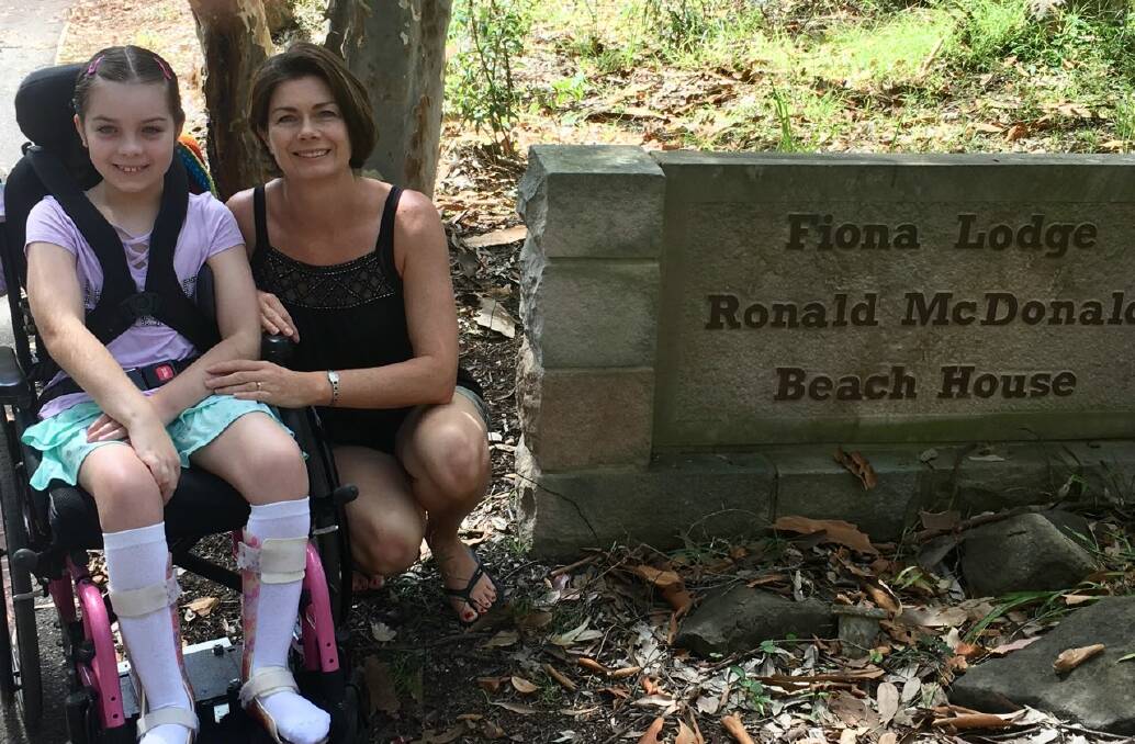 HOLIDAY TIME: Chloe Saxby, 9, and mum Nyree enjoy a well-deserved holiday at Fiona Lodge Ronald McDonald Family Retreat in Rosedale. Chloe suffers from the rare Vanishing White Matter Disease.