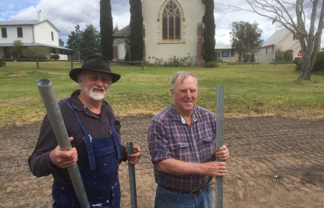 LAYING THE GROUNDWORK: SAGE's Stuart Whitelaw and Moruya Rotary's Rob Richmond got to work at the Moruya peace park site this week.