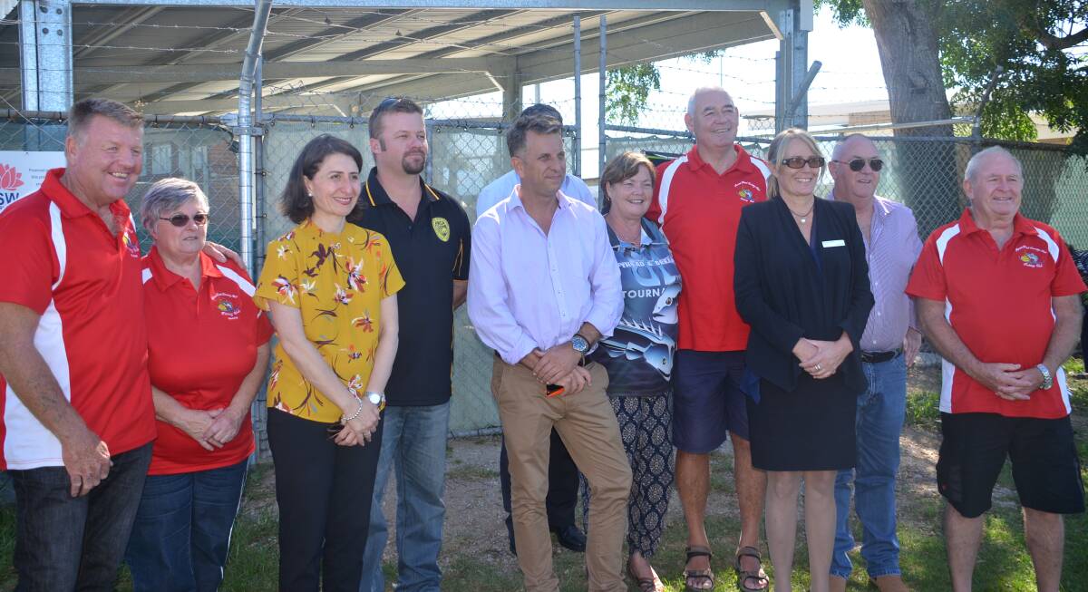 FISHING WIN: NSW Premier Gladys Berejiklian (third from left) at the announcement of an artificial reef for the Batemans Coast, with Adam Martin (fourth from left).