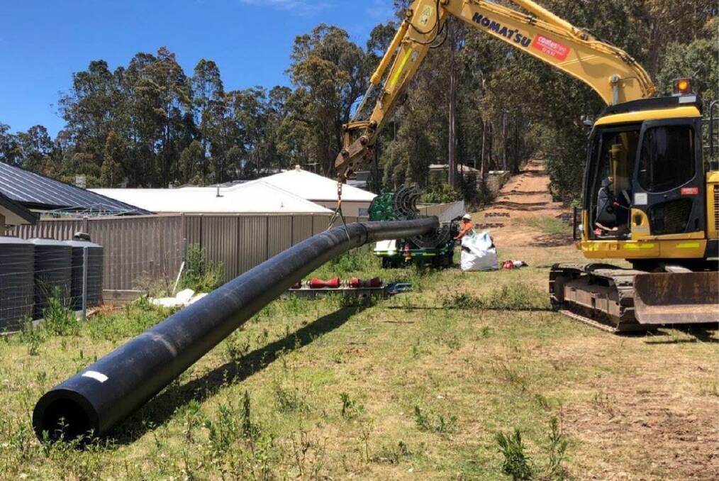 PIPE WORKS: Contractors are now working seven days a week on a project to relocate a rising sewer main in the Cullendulla Creek Nature Reserve before Christmas.