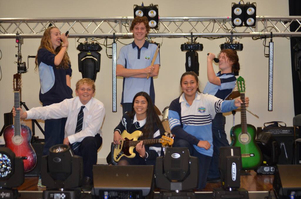 CENTURY OF MUSIC: Sevina Small, Brock Dewinter, Maxwell Eberle, Olivia Faletoese (front), Grace Faletoese and Chloe Woods are ready to rock for St Peter's Anglican College's latest stage production.