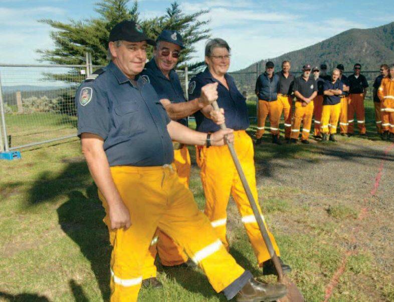 SORELY MISSED: Central Tilba RFS Brigade's Richard Bate (second from left) is being remembered fondly by his RFS colleagues after his death on January 27. Pictured with captain Bruce Allen (left) and Tralee Snape (right) in 2011.