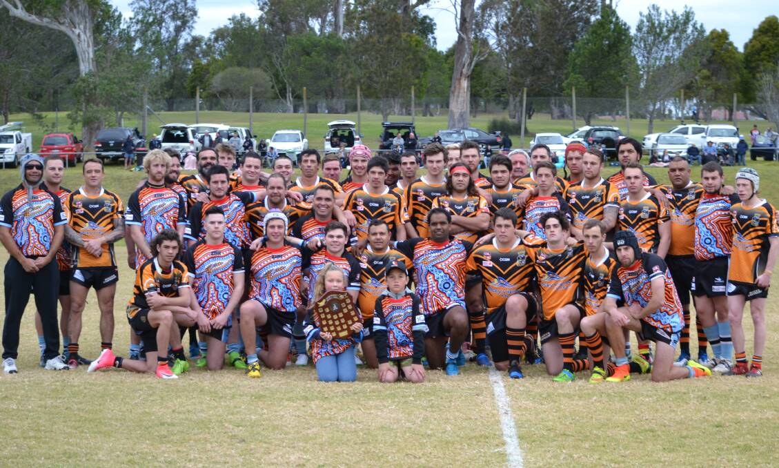 FOR ROBBIE: The Moruya Sharks and Batemans Bay Tigers take to the field for the Robbie Stewart Memorial Shield.