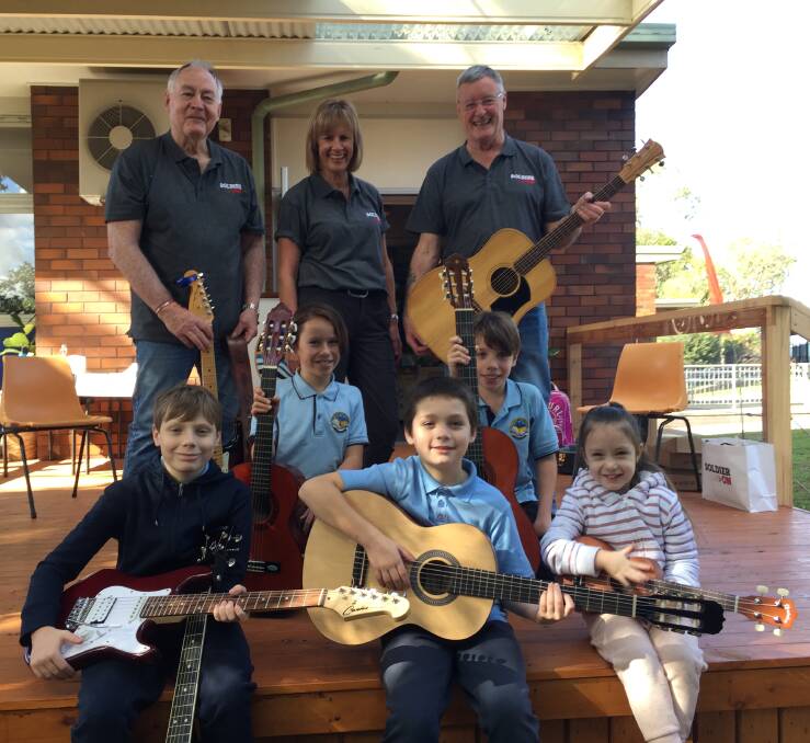 JAM: Dustin Peters, Charlotte Whittaker, Logan Peters, Sam Whittaker and Alexis Peters with their new guitars from ACT Soldier On Music Group.
