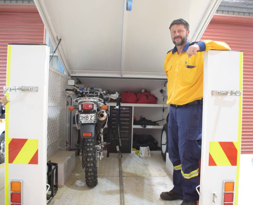 Shoalhaven District Officer Ross Smith with one of the area's new purpose-built trailers for the trail bike team.