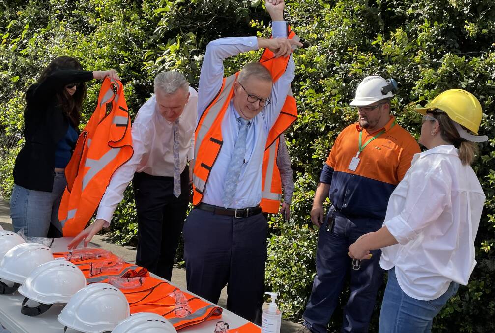READY TO GO: Albo slips into the high-vis.