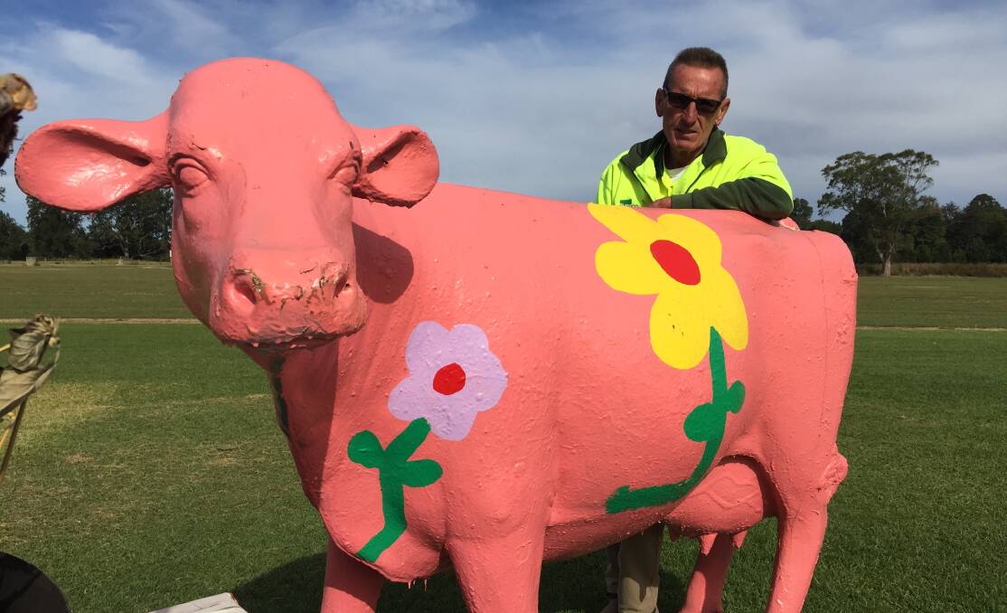 FUN: Turfco Cows designer Scott Parker just likes to give passing motorists some fun..
