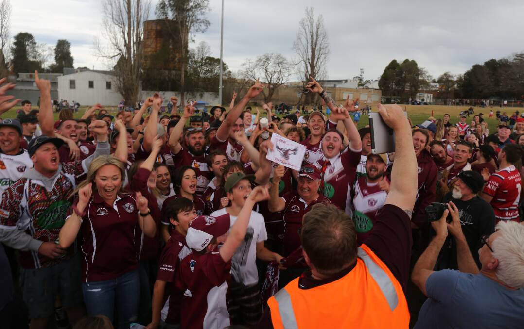 Tathra Sea Eagles volunteer David Porter films celebrations after last year's grand final with Group 16 calling for more volunteers. 
