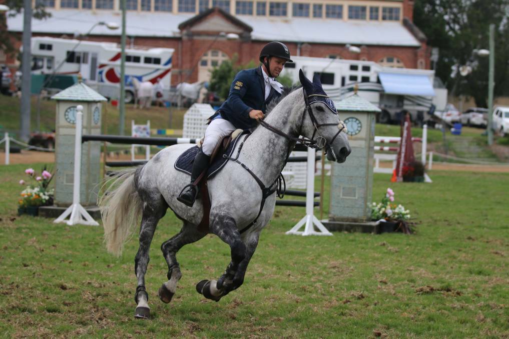 Top contender: Clint Beresford, pictured riding SL Donato previously, will be among the local favourites for the Bega Showjumping Cup. 