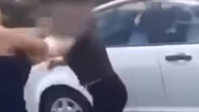 FIGHT: Images from a car park fight filmed on a mobile phone in Bathurst.