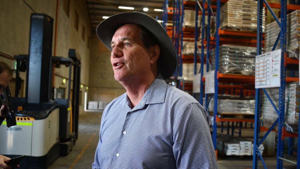Then Queensland Mines Minister Anthony Lynham visits the John Campbell Miles drill core storage facility in Mount Isa in 2019.