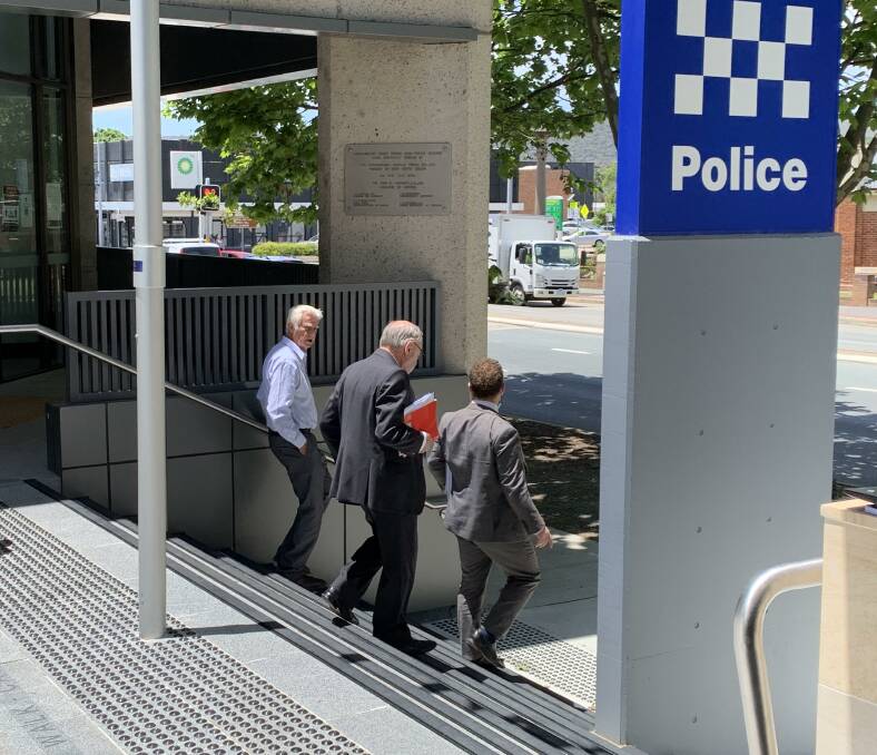 Leslie Windser, left, leaves the Queanbeyan Local Court on Wednesday flanked by his barrister, Paul Winch. Picture: Peter Brewer