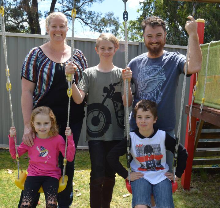 RALLYING CALL: Mum Kristen, Ethan, dad James, Addi and brother Bailey are delighted to be together at home and want the community to rally to help find cures for childhood cancers.