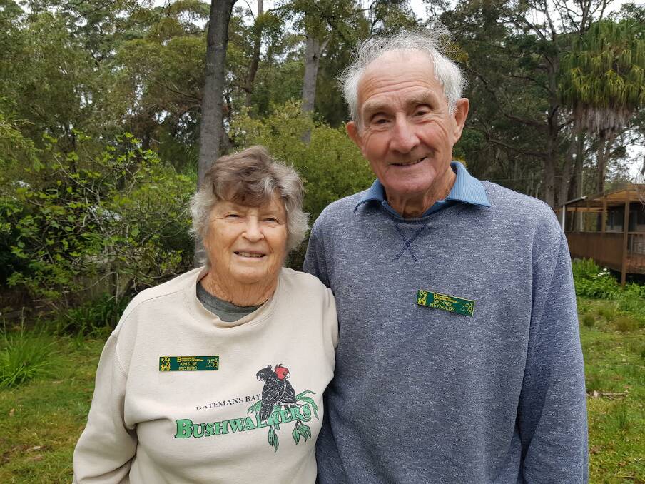 Batemans Bay bushwalkers Ainslie Morris and Mike Reynolds sporting their 25 year anniversary badges.