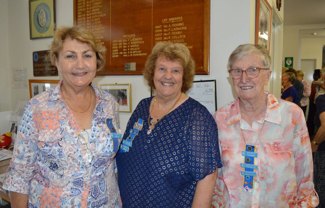 PARTY TIME: Batemans Bay CWA office bearers, secretary Cherie Clarke, president Chris Rossmagus and treasurer Fay Ingram at the branch's 85th anniversary on Saturday.