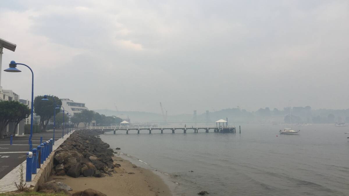 Batemans Bay bridge is hidden by smoke on Thursday morning. Picture: Kerrie O'Connor.