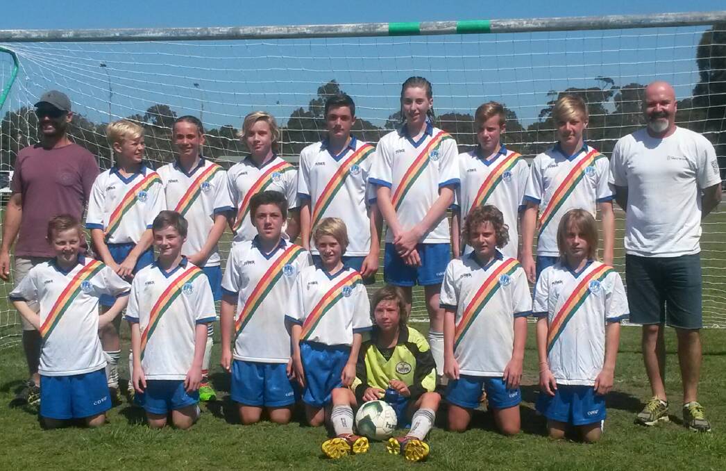 Undefeated champions: Eurobodalla under 13s boys team with assistant coach Mark Anderson and coach Mark Hirst.