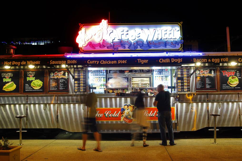 Harry's Cafe de Wheels serving up its 'Tiger' - meat pie with gravy and mushy peas - to hungry folks in Newcastle.
