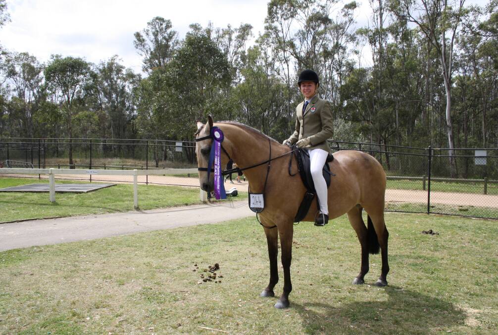 FLIGHT OF THE PHOENIX: Isabella Wall with her horse Phoenix with whom she will be competing at The National Dressage Championships.