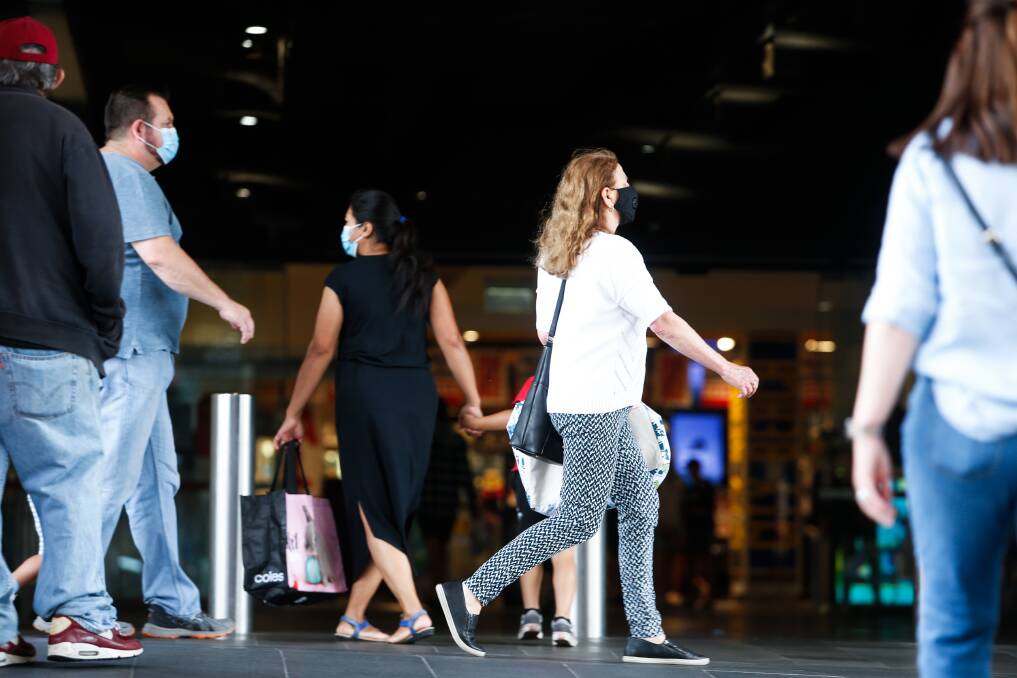 Shoppers adhering to mandatory mask rules at Wollongong Central shopping centre. Masks are mandatory in the Wollongong local government area, but not elsewhere in the Illawarra and South Coast. Picture: Anna Warr