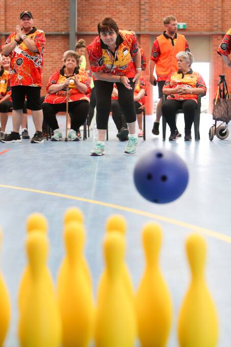 Bowled over: Eileen Collins from the Central Coast team takes part in the ten-pin bowls event at the Mini Olympics at the Unanderra stadium. 
