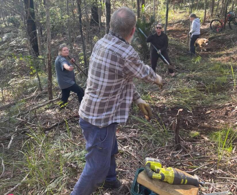 Hard at work: The Narooma Mountain Bike Club has spent countless hours preparing its trail, and will now be aided in stages two and three by Dirt Art. Photo: Mountain Bike Narooma. 