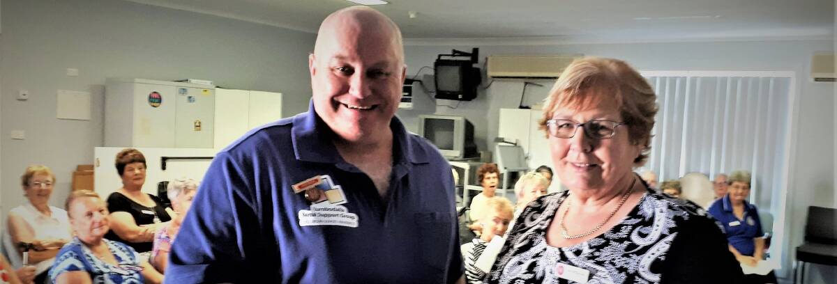 Hospital boost: Brad Rossiter presents a $500 donation to Batemans Bay Hospital Auxiliary president Ann McClintock.