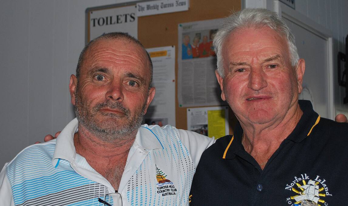 Tuross Head men's golf: Tuross event sponsor Michael Elfar congratulates par winner Michael Hogan.