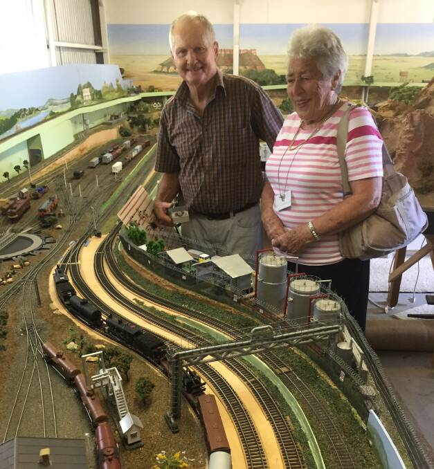 Toot toot: Rob Beswick and Di McGrath watch the trains roll. 