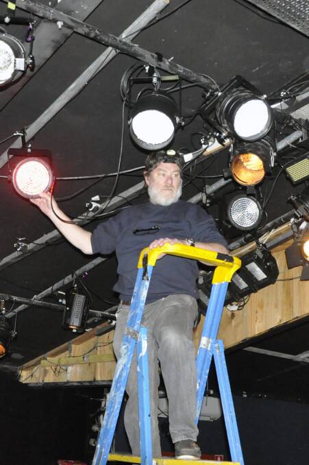Mystical atmosphere: Martyn Lloyd rigging lights for Bay Theatre Players' production of Shakespeare's Macbeth which opens later this month.