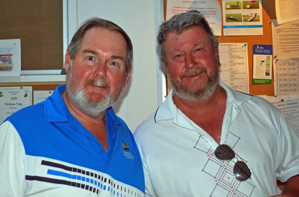 Tuross Head Men's Golf: Bruce Brawn receives his award from Tuross Head Country Club member Stephen Swanbury.