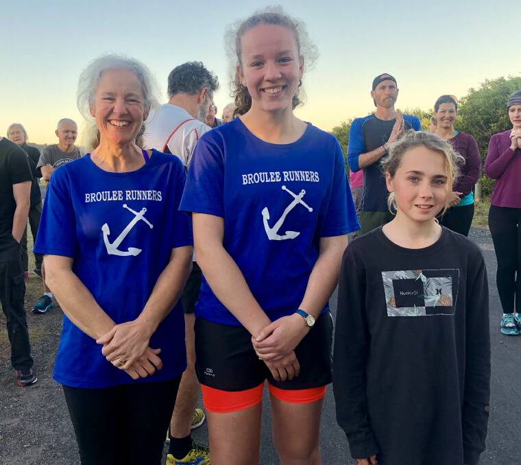 Champion athletes: Stephanie Lunn and Riley Beby with Stephanie's mother Sandra at Wednesday's Broulee Runners event.