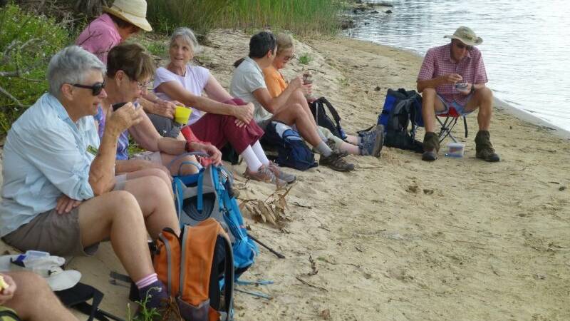 Batemans Bay Bushwalkers enjoy morning tea on the shores of Meroo Lake on their walk from Bawley Point earlier this month. Check out baybushhwalkers.org.au.