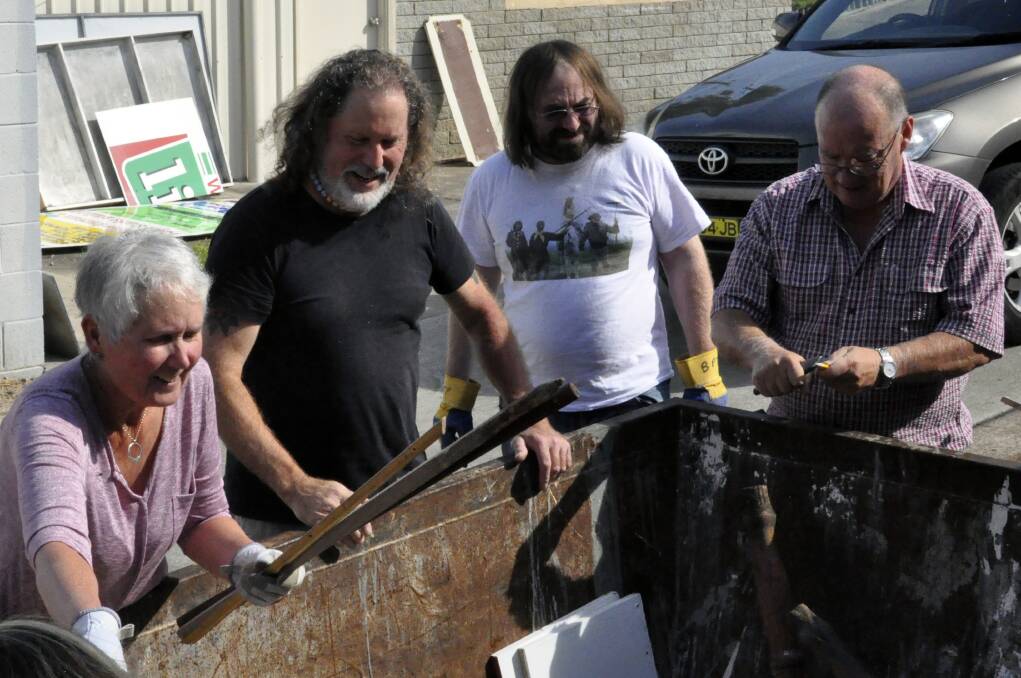 Set design team: Ruth Henderson, Bill Douglas, Paul Perkins and Jon Benn sorting out the materials in the shed to be used in the construction of the Macbeth set. 