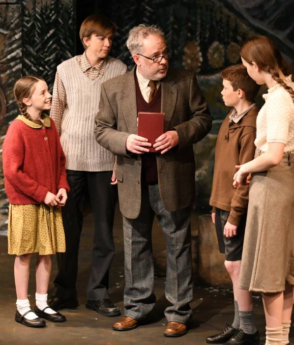 Magical mystery: Siblings (from left, Erin Drewsen, Sam Bath, Sunni West and Charlotte Quick) and the Professor (Bernie Dufield) in a scene from BTP's The Lion, The Witch and the Wardrobe.