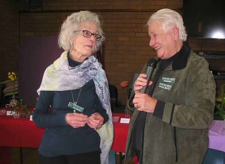 President Magda Smyth presenting Anne Kirkness with her Life Membership.