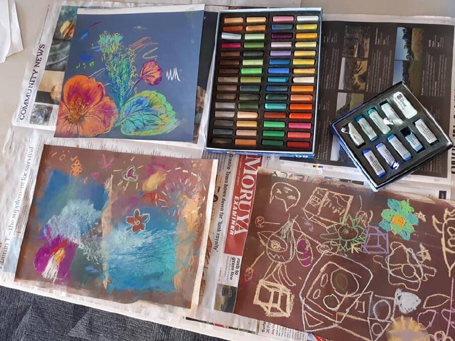 Young talent time: Children get to play with pastels as part of the Pastel Society's exhibition at the surf club, George Bass Drive, Malua Bay.