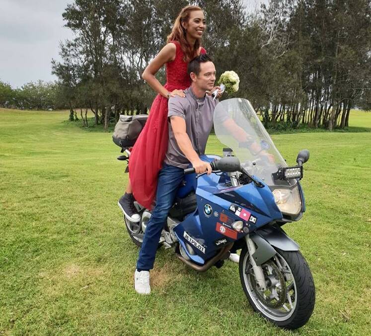 Fashionista: Rein Cubos-Clark and Daniel Clark heading off in style after their wedding at Maloneys Beach on the weekend.