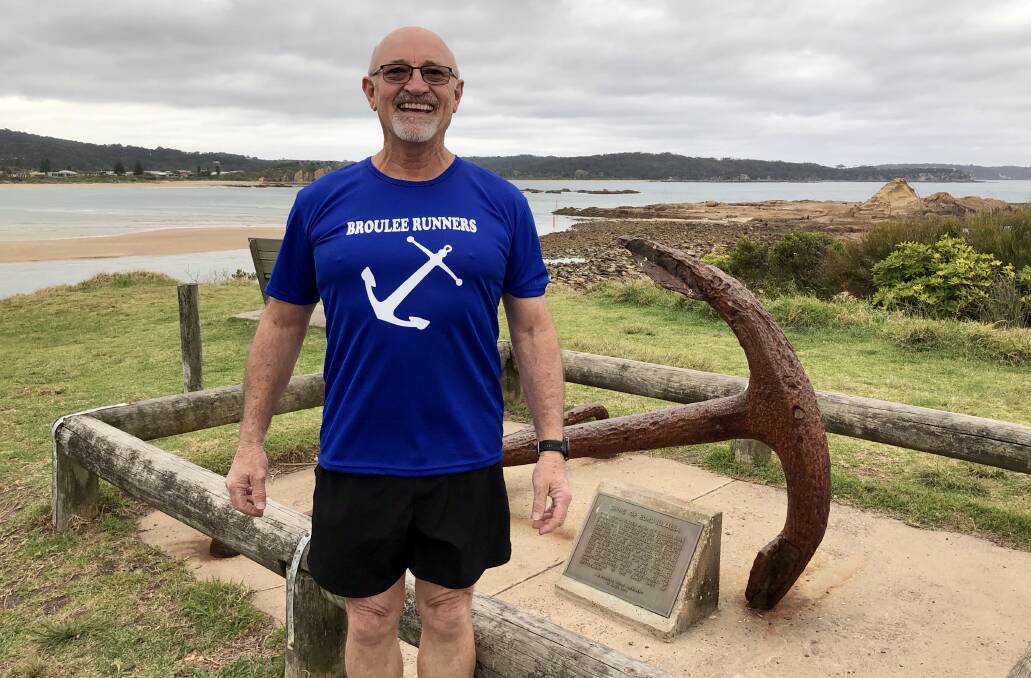 Milestone: Rob Ryan with his Broulee Runners 30-run shirt at the Mossy Point anchor starting point on Wednesday.